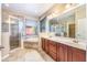 Large bathroom with double vanity, soaking tub and shower at 600 Via Chris Ct, Debary, FL 32713