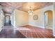 Spacious dining room with hardwood and terracotta tile floors at 600 Via Chris Ct, Debary, FL 32713