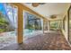 Relaxing screened-in pool area with brick pavers and covered patio at 600 Via Chris Ct, Debary, FL 32713