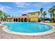 Community pool with a surrounding patio area at 600 Via Chris Ct, Debary, FL 32713