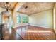 Spacious living room featuring hardwood floors and decorative ceilings at 600 Via Chris Ct, Debary, FL 32713
