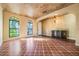 Bright living room with tile floors and arched windows at 600 Via Chris Ct, Debary, FL 32713