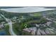 Aerial view showing home location in a residential community near a lake at 600 Via Chris Ct, Debary, FL 32713