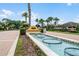 Gated community entrance with water feature and signage at 600 Via Chris Ct, Debary, FL 32713