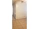Living room with tiled floors and a hallway at 4721 Watch Hill Ct, Orlando, FL 32808