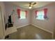 Cozy bedroom with pink walls and carpeted floor at 5937 Colchester Dr, Orlando, FL 32812