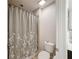 Bathroom with shower/tub combo and floral shower curtain at 4813 Terra Sole Place, St Cloud, FL 34771
