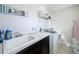 Laundry room with washer, dryer, and utility sink at 4813 Terra Sole Place, St Cloud, FL 34771