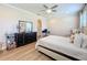 Main bedroom with dresser and view of en-suite at 4813 Terra Sole Place, St Cloud, FL 34771