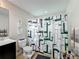 Clean bathroom with a shower/tub combo and modern vanity at 4813 Terra Sole Place, St Cloud, FL 34771