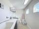 Laundry room with washer, dryer, and utility sink at 4813 Terra Sole Place, St Cloud, FL 34771