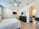 Main bedroom with large dresser and en-suite bathroom at 4813 Terra Sole Place, St Cloud, FL 34771