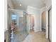 Bathroom with walk-in shower and separate toilet at 4813 Terra Sole Place, St Cloud, FL 34771