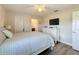 Spacious bedroom with a king-size bed and built-in dresser at 4813 Terra Sole Place, St Cloud, FL 34771