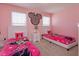 Twin bedroom with Minnie Mouse decor at 5295 Wildwood Way, Davenport, FL 33837
