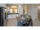 Updated kitchen with granite countertops and an island at 5295 Wildwood Way, Davenport, FL 33837