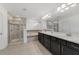 Elegant bathroom with double vanity, soaking tub, and walk-in shower at 3149 Jade Tree Pt, Oviedo, FL 32765
