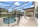 Screened-in pool with a patio, offering a private outdoor space for relaxation at 3149 Jade Tree Pt, Oviedo, FL 32765