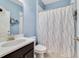 Clean bathroom with shower/tub combo and updated vanity at 3149 Jade Tree Pt, Oviedo, FL 32765