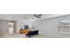 Spacious bonus room with TV and comfortable seating at 3149 Jade Tree Pt, Oviedo, FL 32765