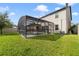 Large backyard with a screened pool and plenty of space at 3149 Jade Tree Pt, Oviedo, FL 32765