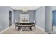 Bright dining room featuring a square table, bench seating, and a chandelier at 3149 Jade Tree Pt, Oviedo, FL 32765