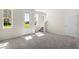 Bright and spacious entryway with neutral carpeting at 164 Holly Village Dr, Davenport, FL 33837