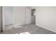 Spacious bedroom with a large closet and neutral wall colors at 164 Holly Village Dr, Davenport, FL 33837