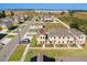 Aerial view of townhome community, highlighting the subject property at 164 Holly Village Dr, Davenport, FL 33837