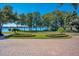 Landscaped front yard with circular brick driveway at 1900 W Fawsett Rd, Winter Park, FL 32789