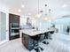 Modern kitchen with large island and stainless steel appliances at 128 Hampton Loop, Davenport, FL 33837