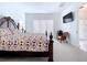 Spacious bedroom with a large bed and plenty of natural light at 128 Hampton Loop, Davenport, FL 33837