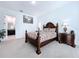 Comfortable bedroom with a double bed and plenty of closet space at 128 Hampton Loop, Davenport, FL 33837