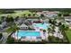 Resort-style community pool and tennis courts at 128 Hampton Loop, Davenport, FL 33837