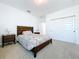 Cozy bedroom with a double bed and plenty of natural light at 128 Hampton Loop, Davenport, FL 33837