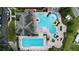 Community pool with lap lanes and water features at 128 Hampton Loop, Davenport, FL 33837