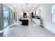 Bright kitchen with island and view to backyard pool at 128 Hampton Loop, Davenport, FL 33837