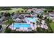 Resort-style community pool and tennis courts at 128 Hampton Loop, Davenport, FL 33837