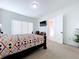 Spacious bedroom with a large bed and plenty of natural light at 128 Hampton Loop, Davenport, FL 33837