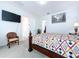 Bright bedroom with a large bed and plenty of natural light at 128 Hampton Loop, Davenport, FL 33837