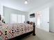 Spacious bedroom with a large bed and plenty of natural light at 128 Hampton Loop, Davenport, FL 33837