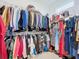 Spacious walk-in closet with ample hanging and shelving space at 128 Hampton Loop, Davenport, FL 33837
