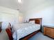 Charming bedroom with a double bed and a view of the backyard at 128 Hampton Loop, Davenport, FL 33837