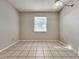 Bright dining area with tile floor and large window at 250 Lewfield Cir, Winter Park, FL 32792