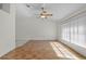 Bright living room with tile flooring and ceiling fan at 101 Neal Dr, Deltona, FL 32738