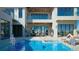 Resort-style pool and spa with patio furniture at 10345 Hart Branch Cir, Orlando, FL 32832