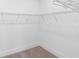 Large walk-in closet with wire shelving, providing ample storage space at 4190 Rossmore Dr, Orlando, FL 32810