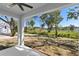 Covered patio overlooking the lake at 4190 Rossmore Dr, Orlando, FL 32810
