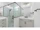 Spa-like bathroom with a large walk-in shower and marble finishes at 4190 Rossmore Dr, Orlando, FL 32810