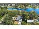 Aerial view of house near lake at 4190 Rossmore Dr, Orlando, FL 32810